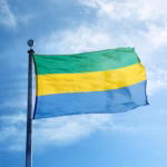 Gabon Flag flying in the sky