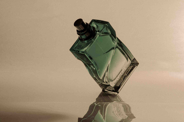 An image showing a bottle of perfume.